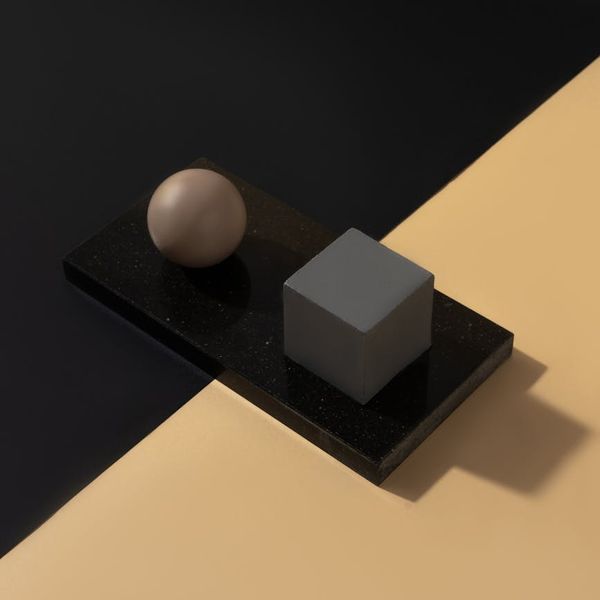 Abstract glowing geometric shapes reflecting balance